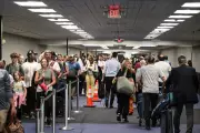 US Airports Face Four-Hour Security Delays Despite ICE Deployment Amid DHS Shutdown