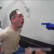 Violent Thug Headbutts Police Officer Unconscious in Hospital Corridor Attack