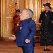Warwick Davis Receives OBE Honour from Prince William at Windsor Castle