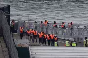 325 Migrants Arrive in UK After Two Die in Channel Crossing Attempt