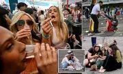Aintree Ladies Day Revelry: Glamorous Racegoers Slump in Car Park After Grand National Festivities