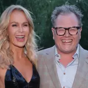 Amanda Holden Stuns in Sheer Dress at BAFTA TV Nominees Party with Alan Carr