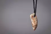 Ancient Seal Tooth Pendant Found in Devon Cave Reveals Stone Age Maritime Culture