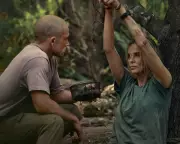 Apex Review: Theron and Egerton's Slick but Soulless Cat-and-Mouse Game