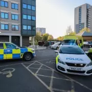 Armed Police Seal Off Blackley Tower Block in Major Incident Response