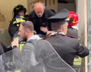 Armed Robbers Hold 25 Hostages at Naples Bank Before Fleeing Through Sewer Tunnel