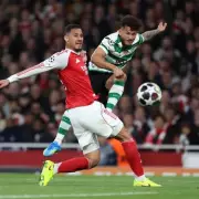 Arsenal Advance to Champions League Semi-Finals After Tense Draw with Sporting