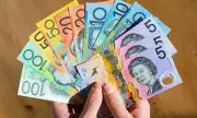 Australians Urged to Withdraw Cash Today to Keep It Circulating