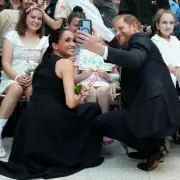 Body Language Experts Brand Harry and Meghan's Australian Visit as 'Divisive and Repulsive'