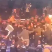 Boxing Title Fight Abandoned After Fans Storm Ring in Violent Brawl