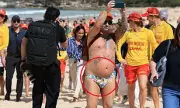 Budgie Smuggler Fan Embraces Prince Harry on Bondi Beach Visit