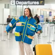 Charlotte Crosby Models 12-Pocket 'Book Jacket' for Holiday Reading