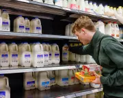Coles and Woolworths Hike Milk Prices Amid Middle East Conflict Pressures