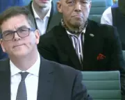 Cravat-Wearing Man Disrupts Parliament Committee Live Stream