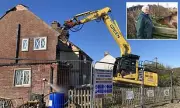 Demolition of Three Erosion-Threatened Homes in Norfolk Village Begins