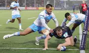 Glasgow Warriors Battle Through Storm to Secure Champions Cup Quarter-Final