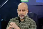 Guardiola Warns: Man City Title Hopes Over with Defeat to Arsenal