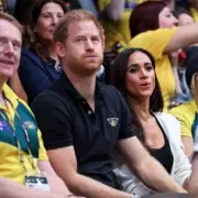 Harry and Meghan Arrive in Australia to Lukewarm Reception Amid Security Row