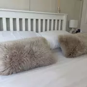High Street Sheepskin Cushion Transforms Bedroom into Luxury Hotel