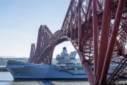 HMS Queen Elizabeth Sails Under Forth Bridge for Sea Trials