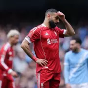 Jamie Carragher's Tribute to Salah Amid Liverpool's Turmoil and PSG Clash