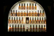 Kentucky Bourbon Industry Faces Crisis as Production Cuts Clash with Billion-Dollar Bets