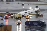 LaGuardia Jet Crash Claims Firefighter's Life