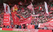 Liverpool Fans Remove Kop Flags in Protest Against Ticket Price Hikes