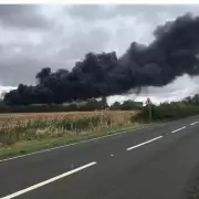 Major Industrial Estate Fire Engulfs Nottinghamshire, Residents Urged to Stay Indoors