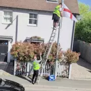 Man receives vile abuse after confronting St George's flag raisers