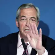 Nigel Farage Clashes with Reporter Over Richard Tice Tax Questions