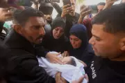 Palestinians Bury Pregnant Woman and Children Killed in Israeli Strikes
