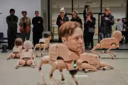 Robot Dogs with Musk and Zuckerberg Heads Roam Berlin Gallery in Beeple Exhibit