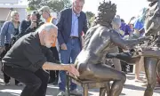 Rub Terry Jones's bottom for luck, says daughter at statue unveiling