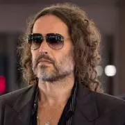 Russell Brand Admits Exploitative Relationship with Teen at 30, Faces Seven Charges