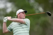 Texas Open Suspended: MacIntyre and Aberg Lead as Storms Force Play to Sunday