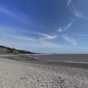 Tragic Death of 21-Year-Old Woman Found Underwater at Welsh Beach