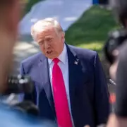 Trump Cuts $11 Million Catholic Charity Funding Amid Pope Feud