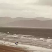 Woman Alarms Police After Finding Mysterious Message in Bottle on Beach