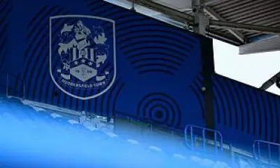 Huddersfield Town boss Liam Manning leaves after compassionate leave