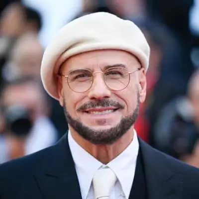 John Travolta's Dramatic New Look at Cannes Divides Fans