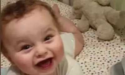 Teacher Denies Taking 'Trophy' Images of Abused Baby He Sought to Adopt