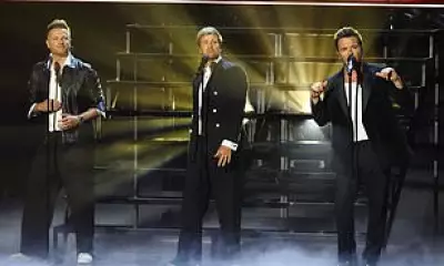 Westlife Storm Charts After Emotional BGT Reunion with Simon Cowell