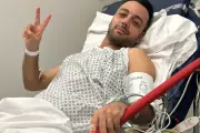 Attackers laughed after stabbing Iranian journalist, UK court hears