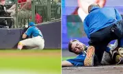 Brewers' Lockridge carted off after gruesome wall collision