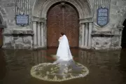 Bride Wades Through Flood to Reach Church: Photographer’s Viral Shot