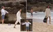 Dad accidentally steals show at Australian Fashion Week beach runway