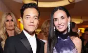 Demi Moore Stuns in Purple Sequin Gown at Red Sea Film Gala with Rami Malek