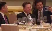 Elon Musk Pulls Faces as Chinese CEOs Mob Him for Photos in Beijing