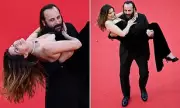 French Actor Carries Model Up Cannes Red Carpet at Karma Premiere